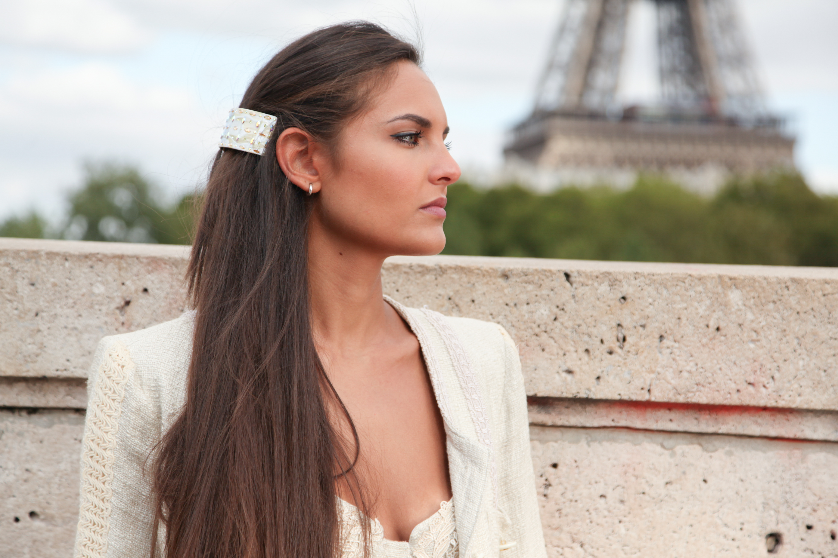 Side view of thick voluminous hair — illustrating why standard clips fail to hold