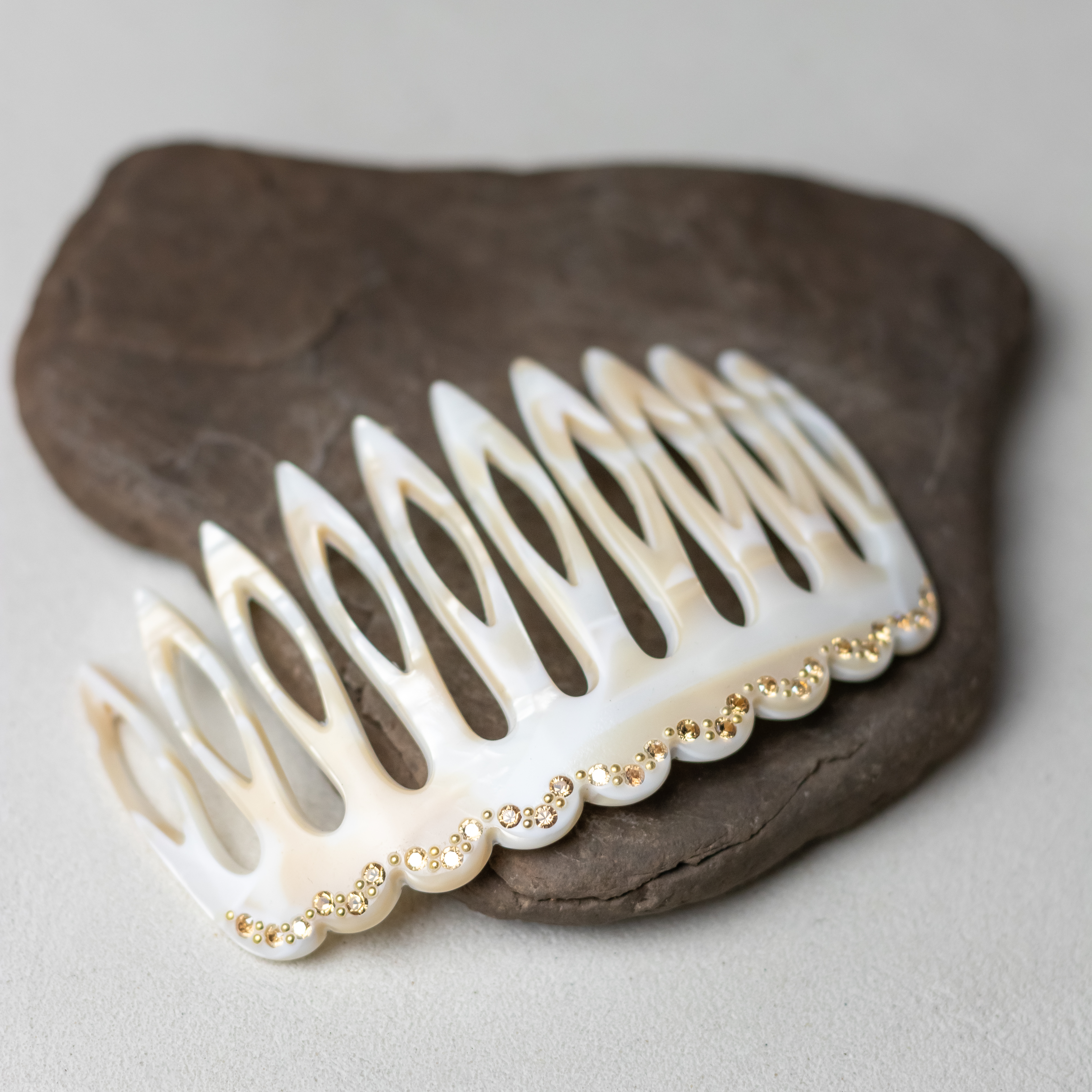 Woman wearing a MC Davidian Groovy Hair Comb GM in a chignon bun — handmade French hair comb