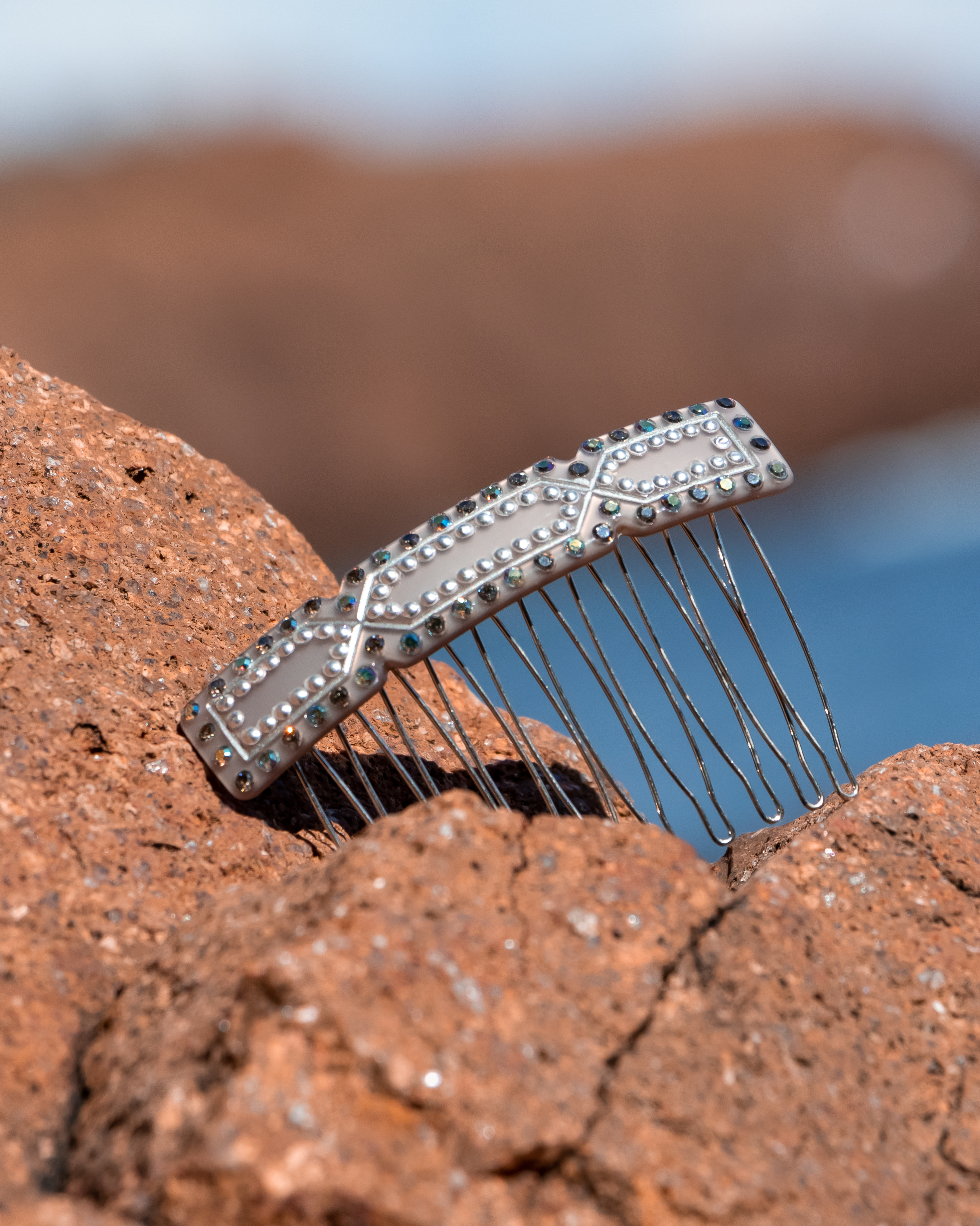 Woman wearing a MC Davidian Greek Brillant Golden Comb MM — rhinestone metal comb as braided updo accent