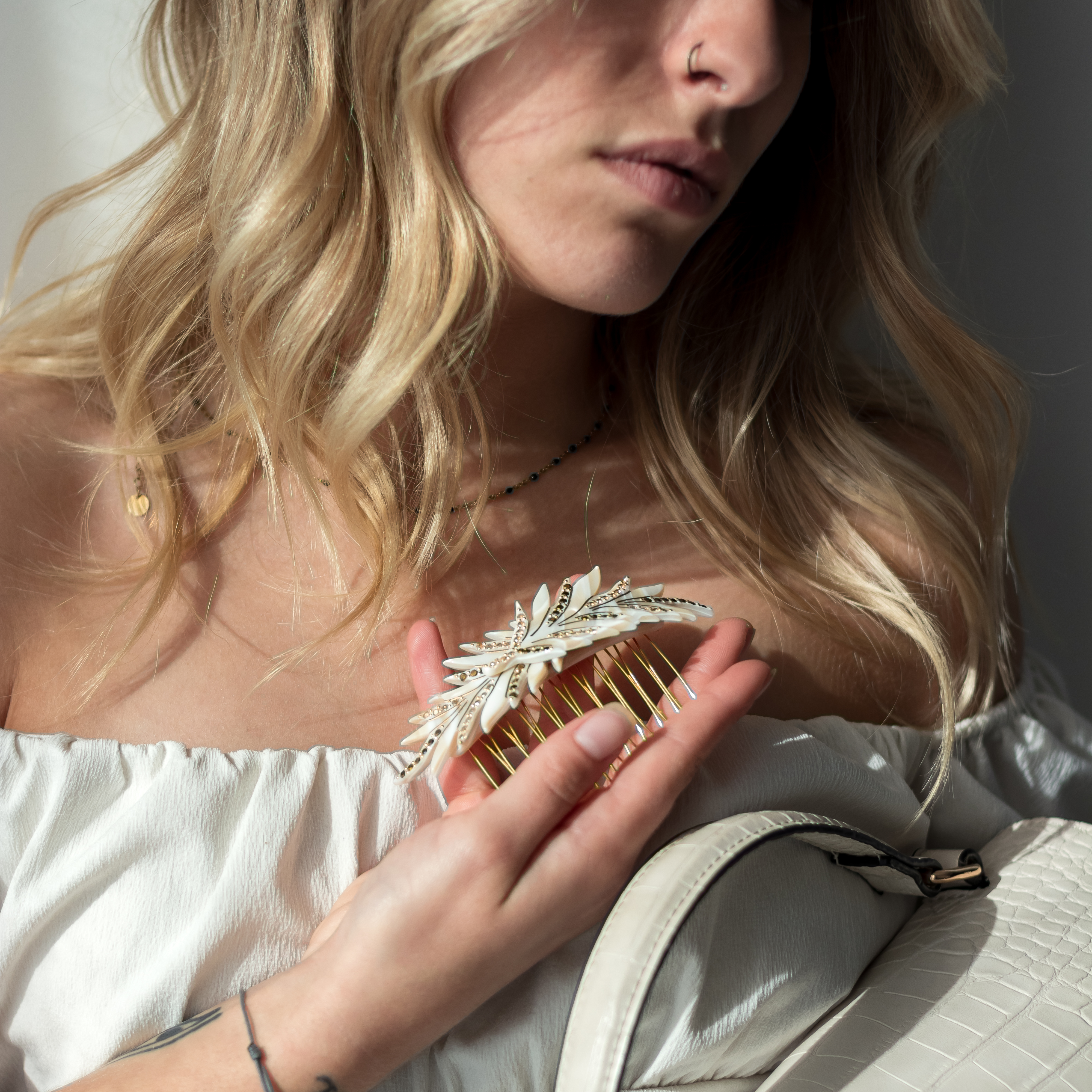 Woman wearing a MC Davidian comb — how to use a French hair comb